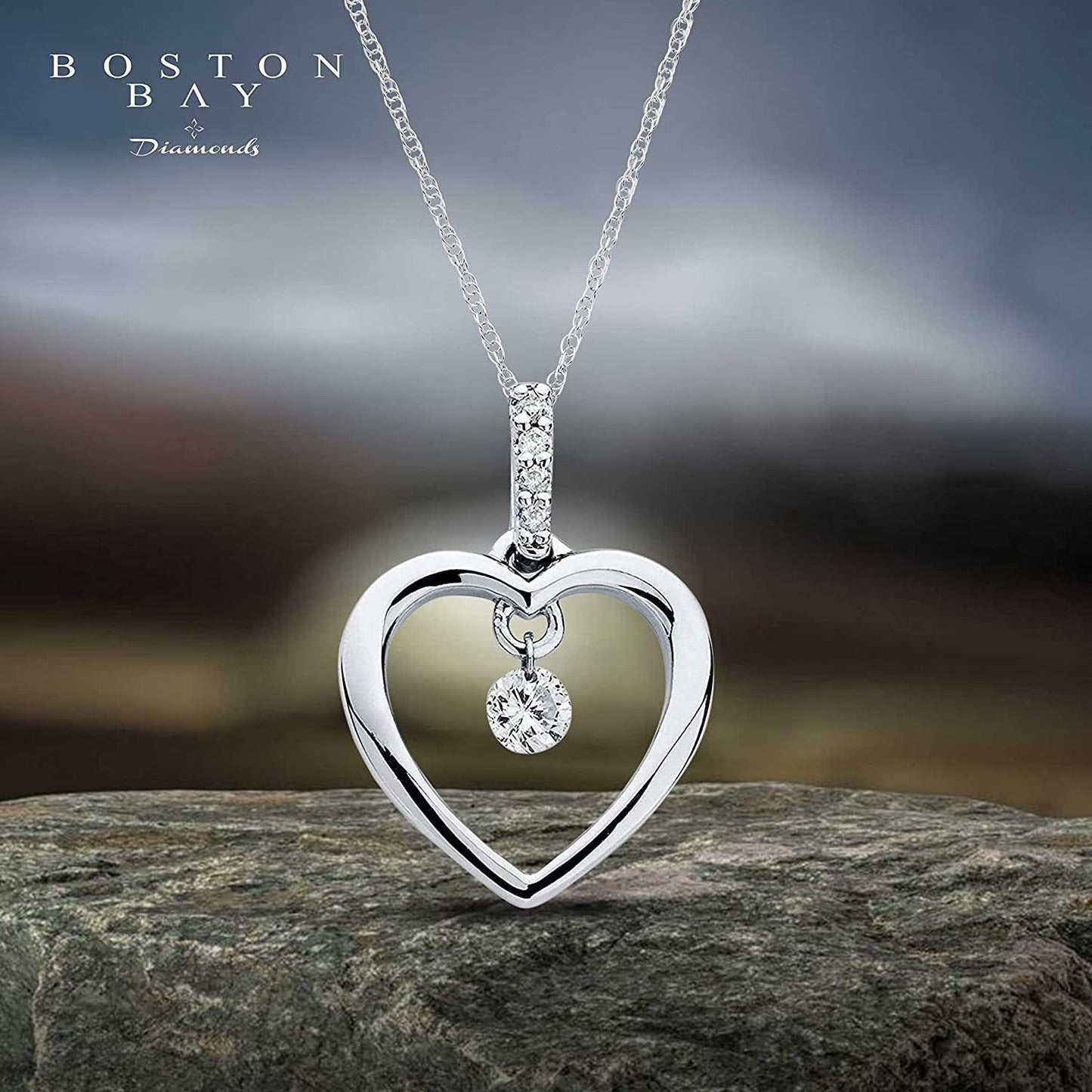 1/10cttw Dancing Genuine Diamond Heart Pendant in Sterling Silver