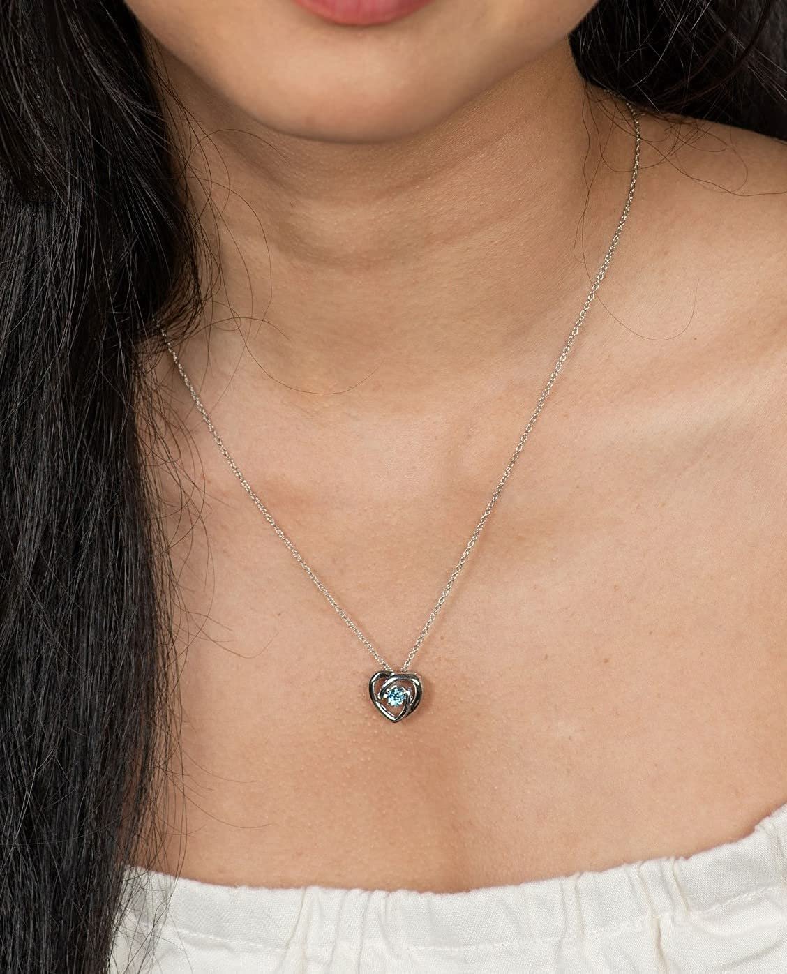 Genuine Blue Topaz Dancing Gemstone Heart Pendant in Sterling Silver