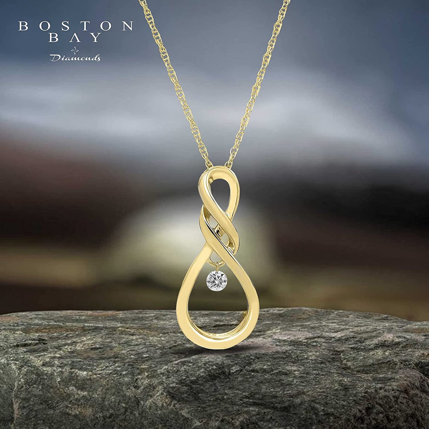 1/12cttw Dancing Diamond Infinity Pendant in 14K Yellow Gold Sterling Silver