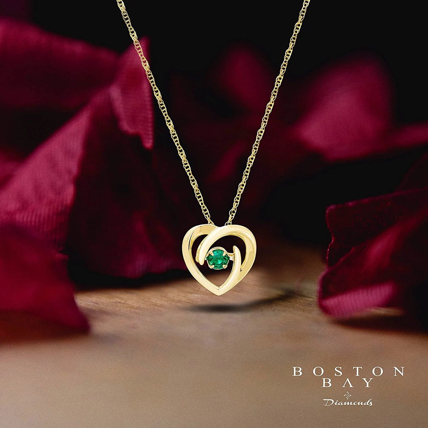 Lab-Grown Emerald Dancing Gemstone Heart Pendant in 14K Yellow Gold Sterling Silver