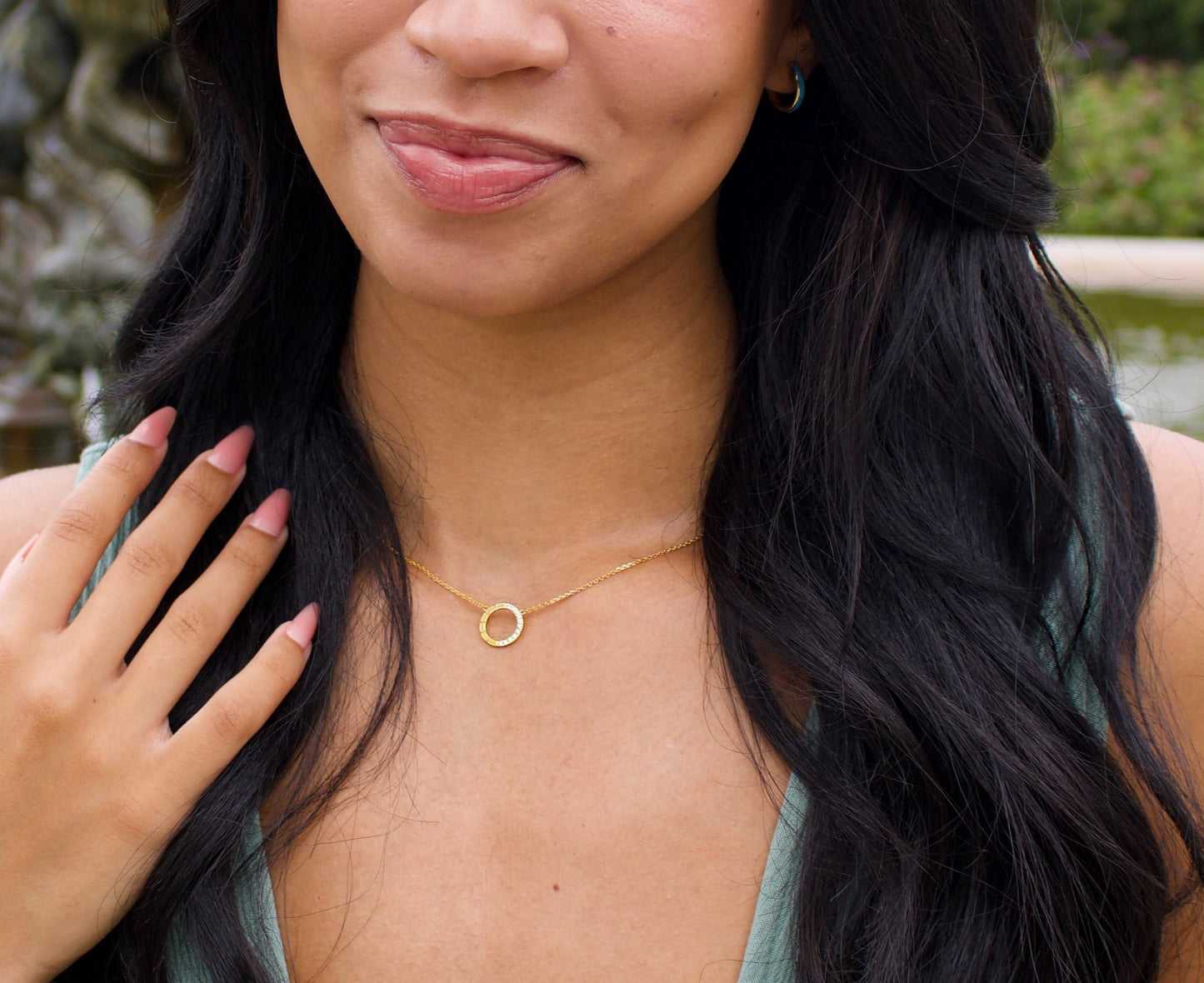 1/8cttw Diamond Circle Pendant in 14K Yellow Gold plated Sterling Silver with Chain