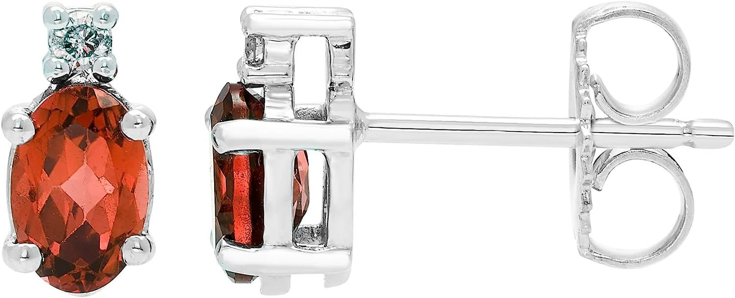 Garnet Oval Cut & Diamond Accented Stud Earrings in .925 Sterling Silver