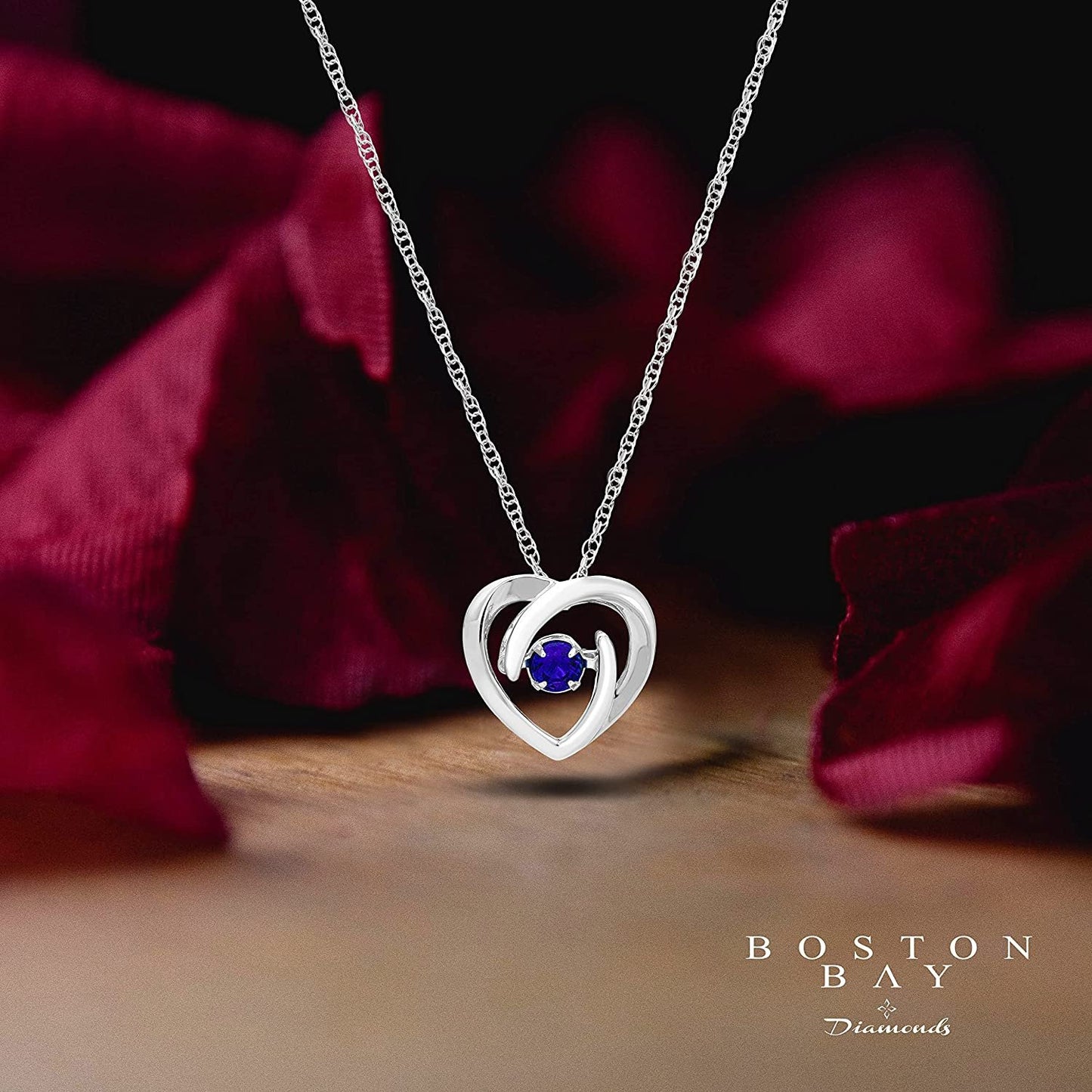 Created Blue Sapphire Dancing Gemstone Heart Pendant in Sterling Silver