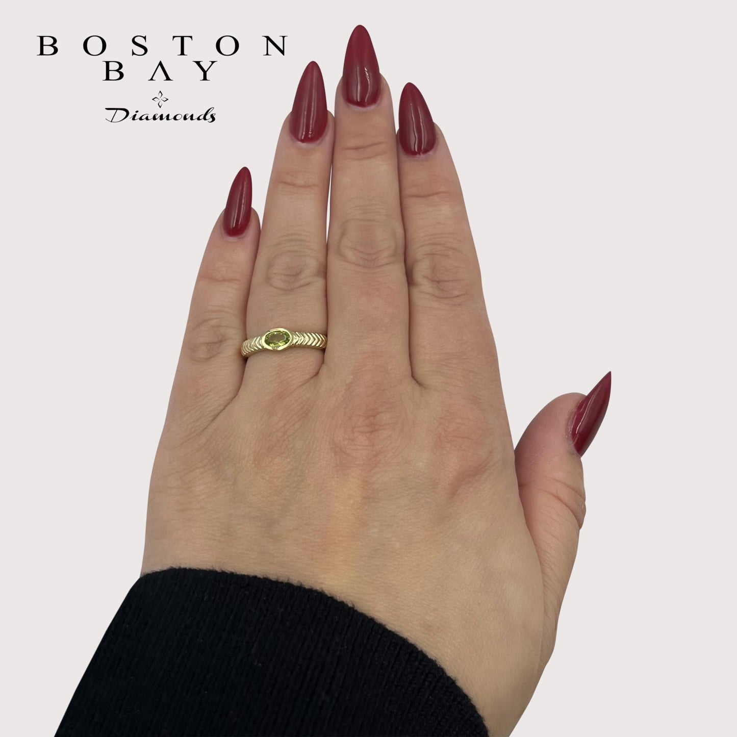 Oval Peridot Ring in 14K Yellow Gold Plated Sterling Silver