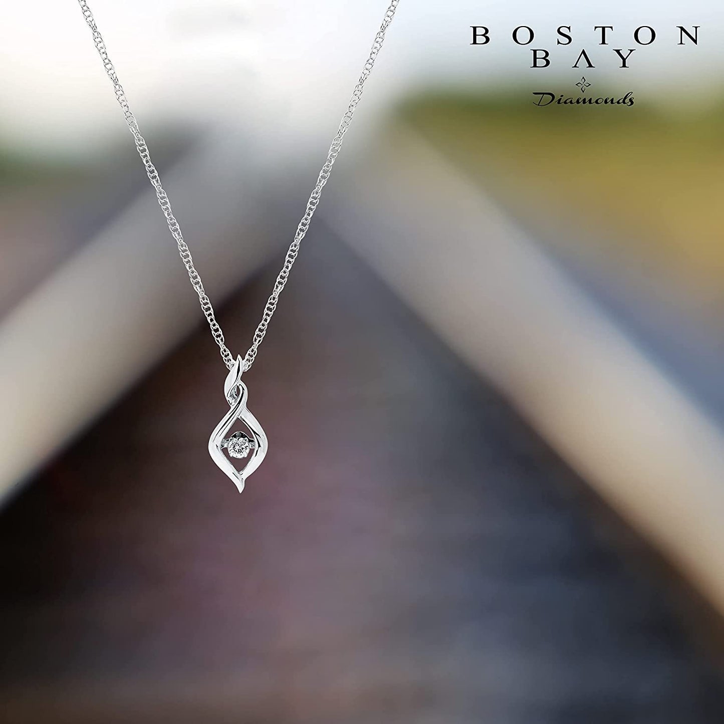 1/8cttw Genuine Dancing Diamond Infinity Pendant Sterling Silver